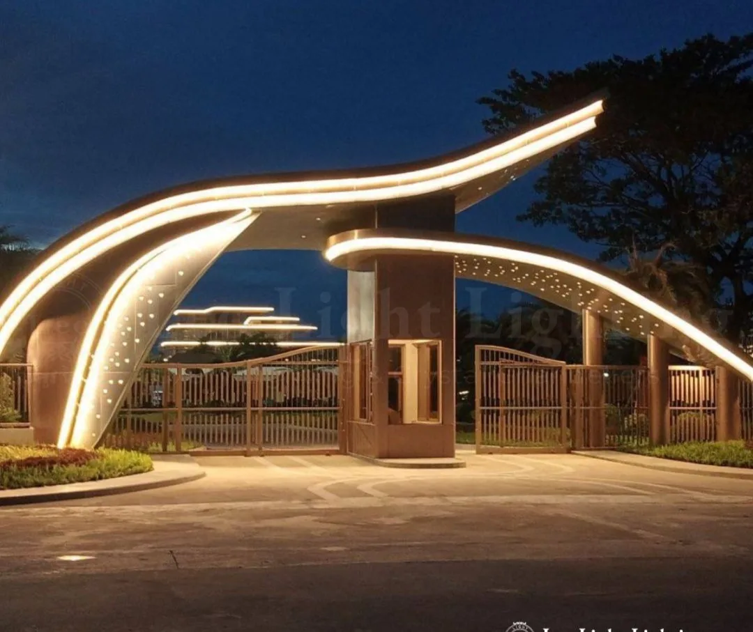 Illuminated architectural gateway at dusk
